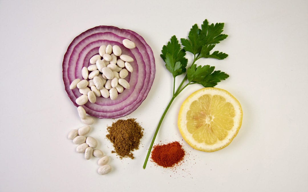 White Bean Salad with Lemon and Cumin | White beans, a slice of onion, slice of lemon, a sprig of parsley, cumin and cayenne.