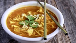 Spicy Ramen-Style Soup: New Flavors, Old Memories | ramen noodles in a bowl with chopsticks on top