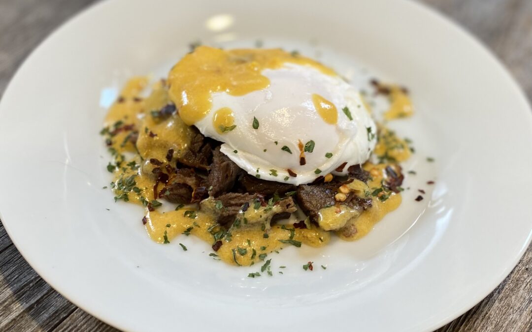 Life At The Table | How to Poach an Egg. Poached egg atop a bed of shredded beef with a chipotle hollandaise.